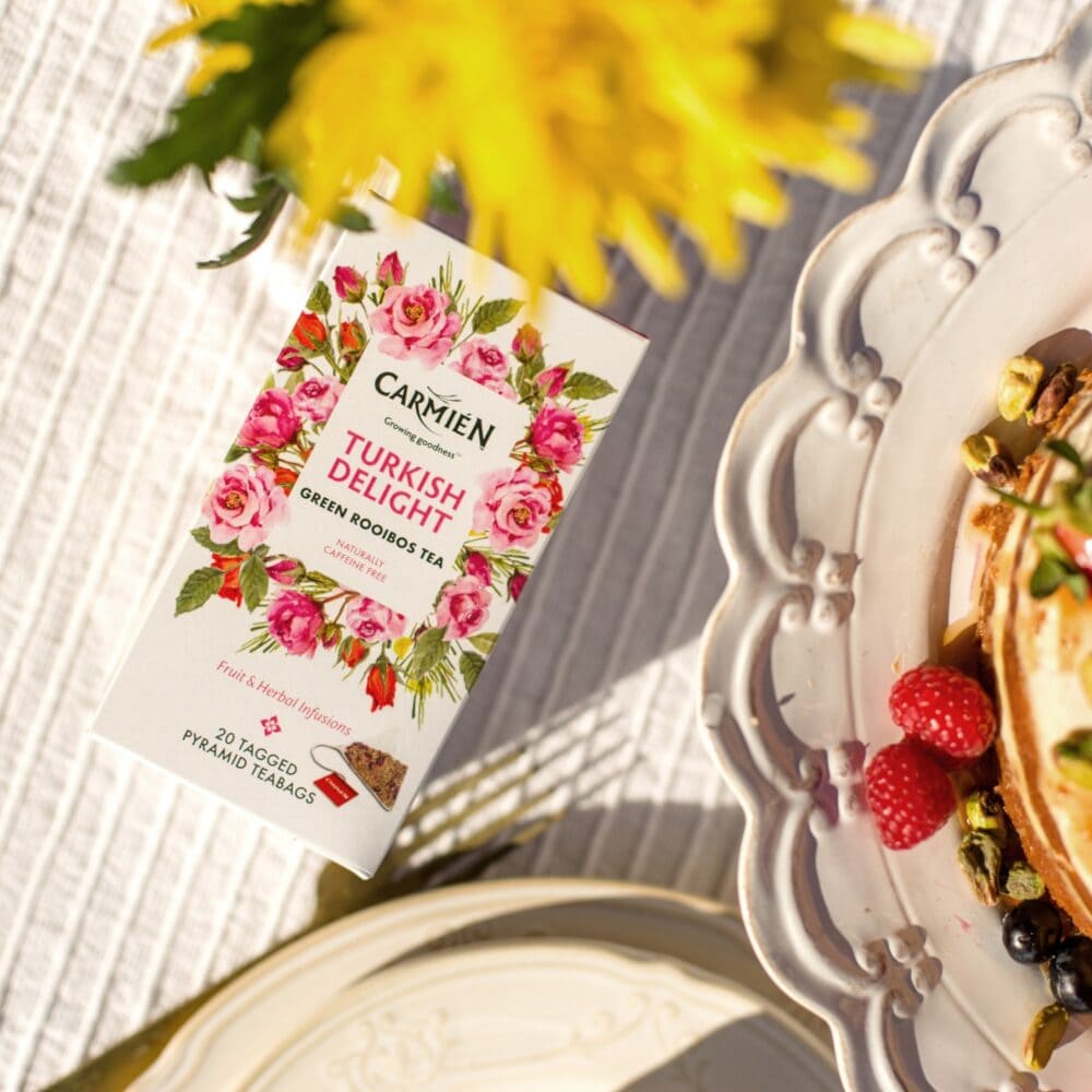 Carmién Tea Turkish Delight pyramid tea bags with floral packaging, ideal for rooibos tea lovers seeking premium blends.