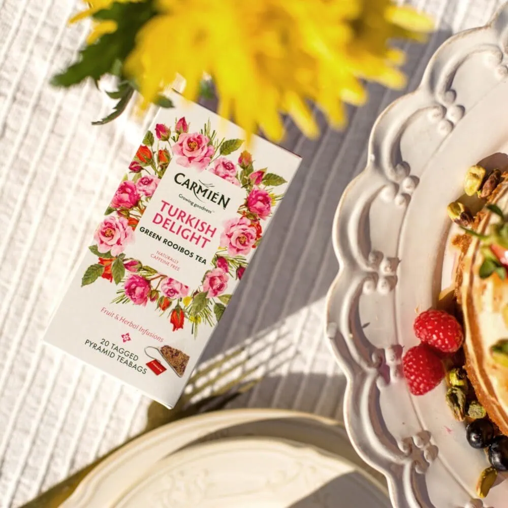 Carmién Tea Turkish Delight pyramid tea bags with floral packaging, ideal for rooibos tea lovers seeking premium blends.