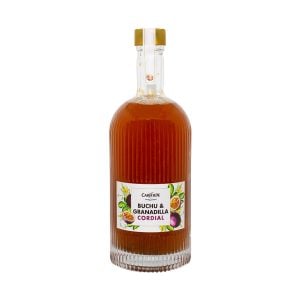 Rich Red Buchu and Granadilla Cordial in a stylish glass bottle with a ribbed design and a gold cap for authentic South African herbal flavor.