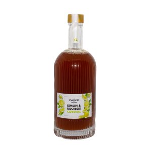 Refreshing Lemon & Rooibos Cordial in a clear ribbed glass bottle, highlighting the natural ingredients and vibrant citrus flavor, perfect for healthy, revitalizing beverages.