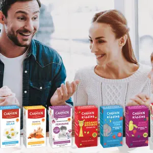A happy family enjoys rooibos tea together