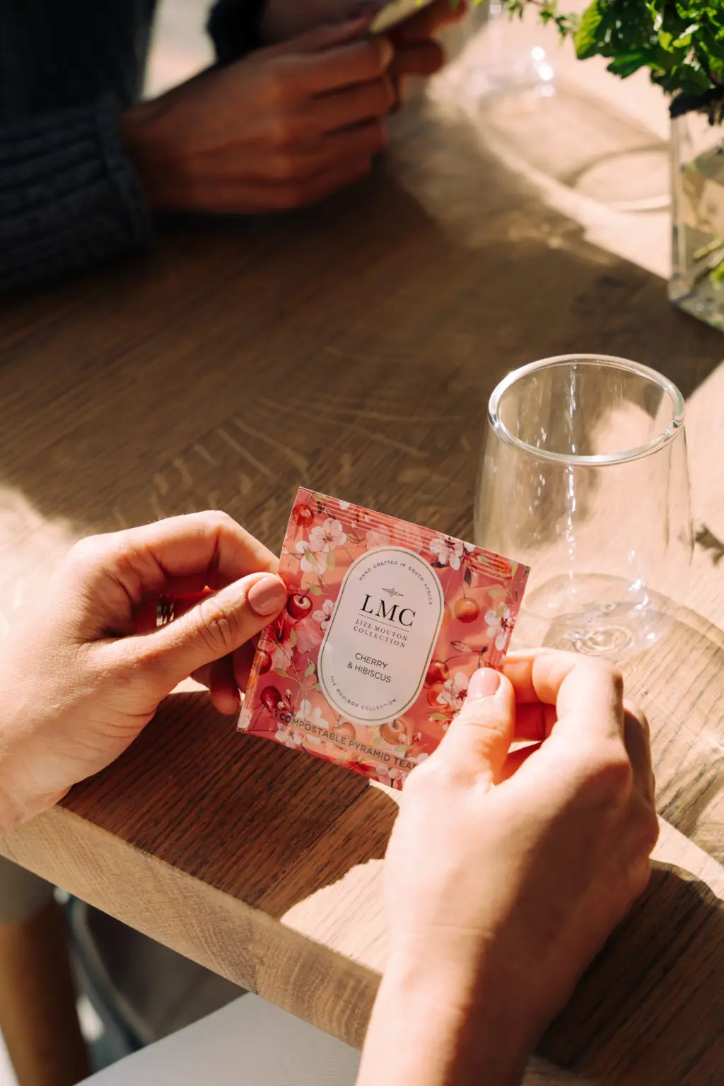 Organic Carmién Tea, herbal tea from South Africa, made with rooibos, honeybush, and natural ingredients, promoting health and wellness, eco-friendly, and handcrafted.