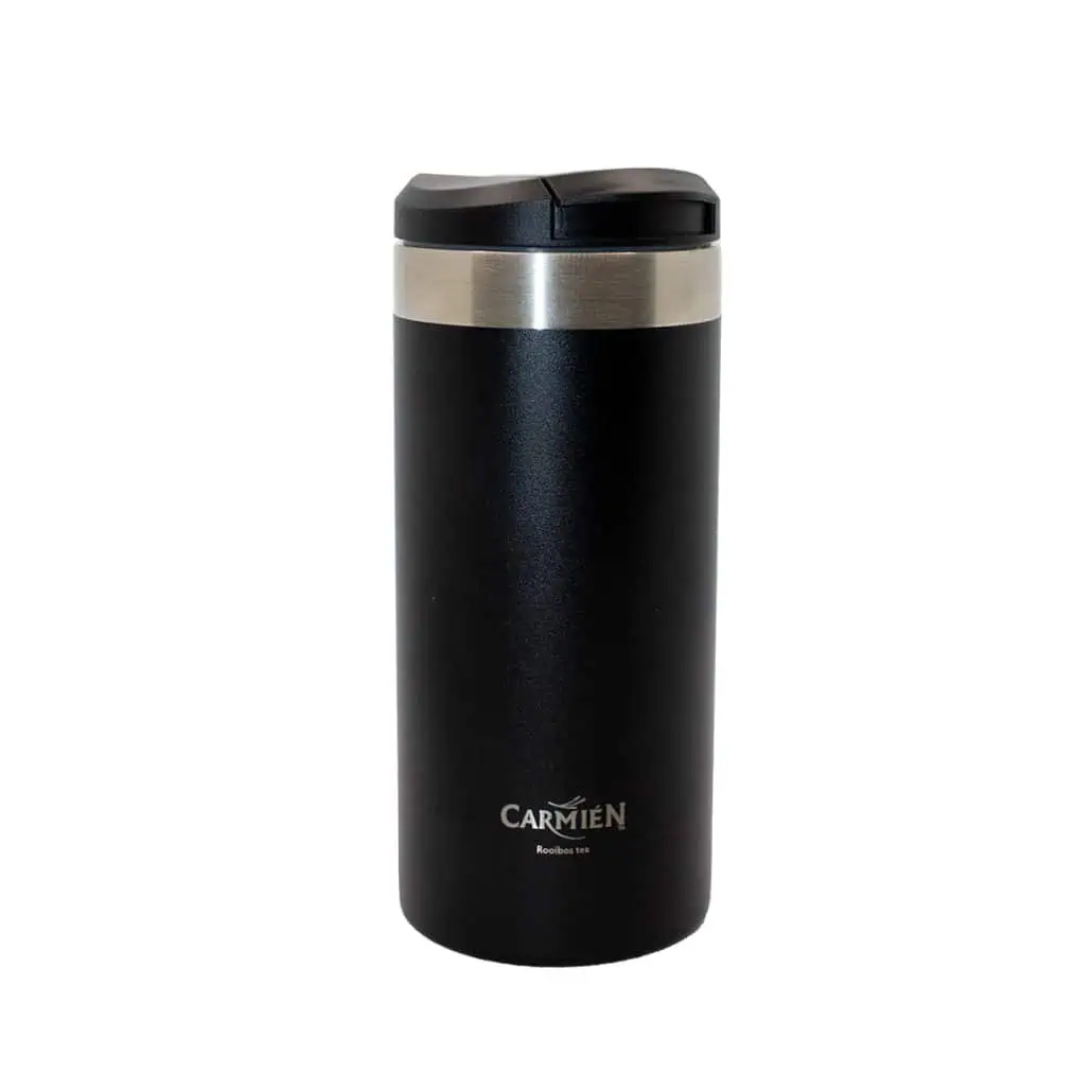 Freshly brewed Carmien Rooibos tea in a sleek black travel mug, perfect for enjoying the natural health benefits of South African Rooibos. Ideal for tea lovers on the go.