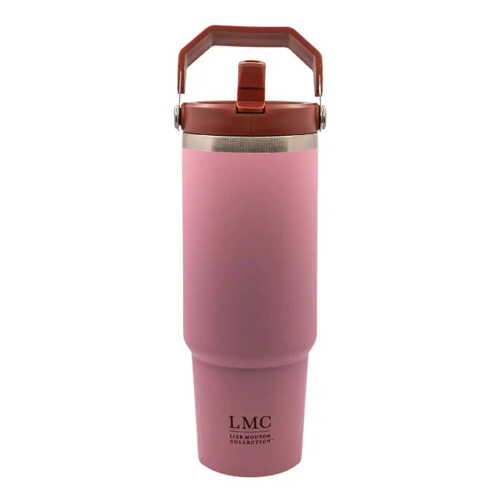 Stainless steel pink insulated tea tumbler with lid, designed for hot and cold beverages, featuring the LMC Liz Mouton Collection logo, ideal for everyday use.