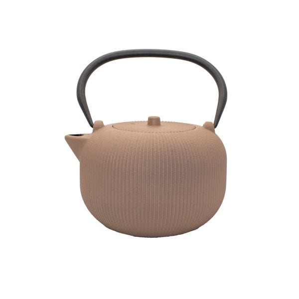 Elegant beige cast iron teapot with a black handle, perfect for brewing traditional Herbal and Rooibos teas from Carmién Tea South Africa.