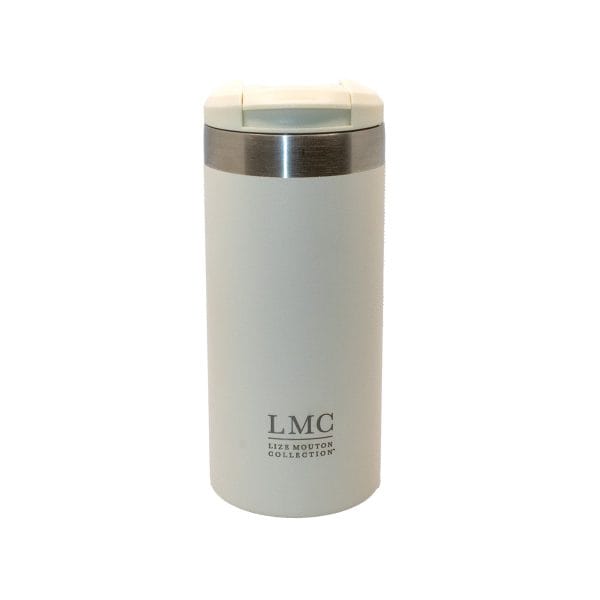 Steaming mug with Liz Mouton Collection branding, perfect for enjoying Carmién Tea, a popular South African herbal tea known for its health benefits and unique floral flavor.