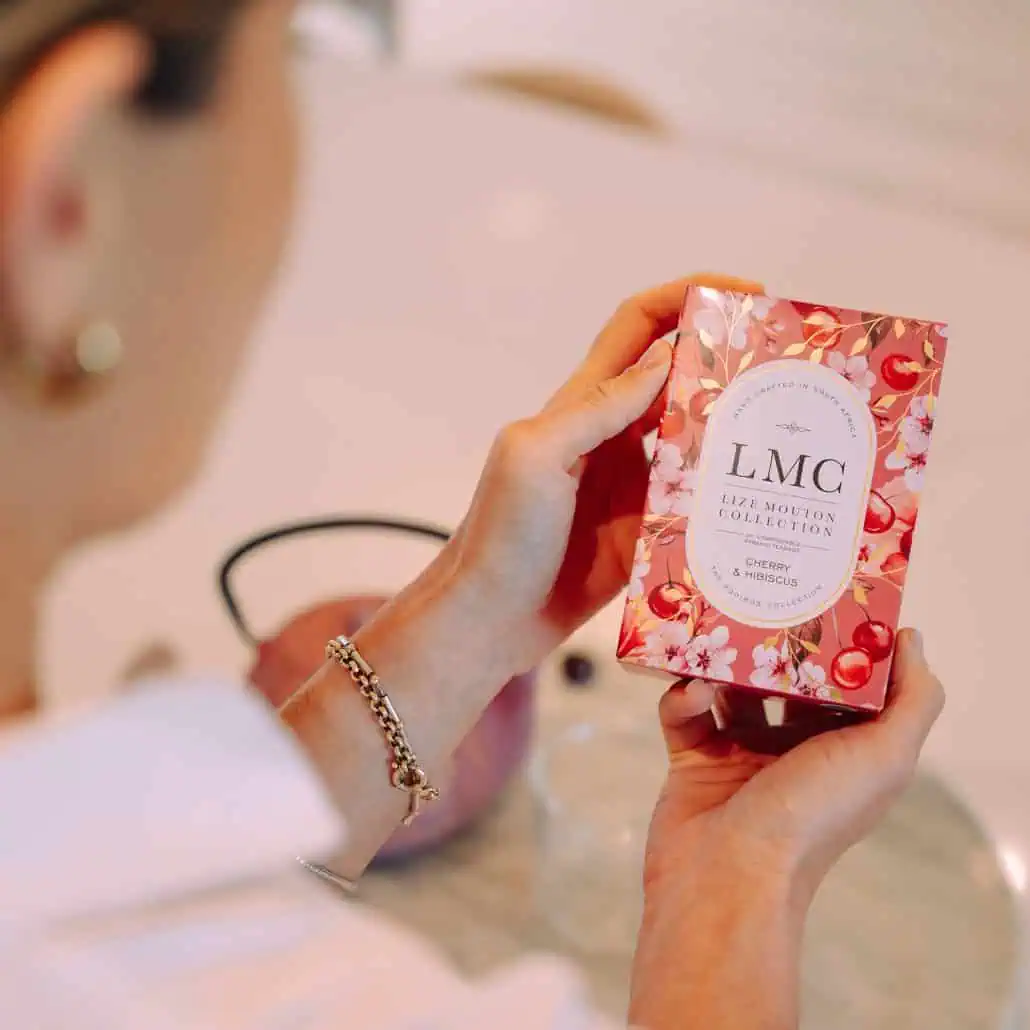 Delicious Carmién Tea from South Africa, featuring cherry and hibiscus flavours, packaged in eco-friendly, beautifully designed boxes, perfect for tea lovers seeking a natural, aromatic beverage.