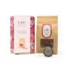 LMC_CherryTin_Loose_V2 copy Relaxing herbal tea set with loose leaf tea and strainer, part of the CarmiƩn Tea LMC collection, featuring cherry and hibiscus rooibos for wellness and natural flavor.