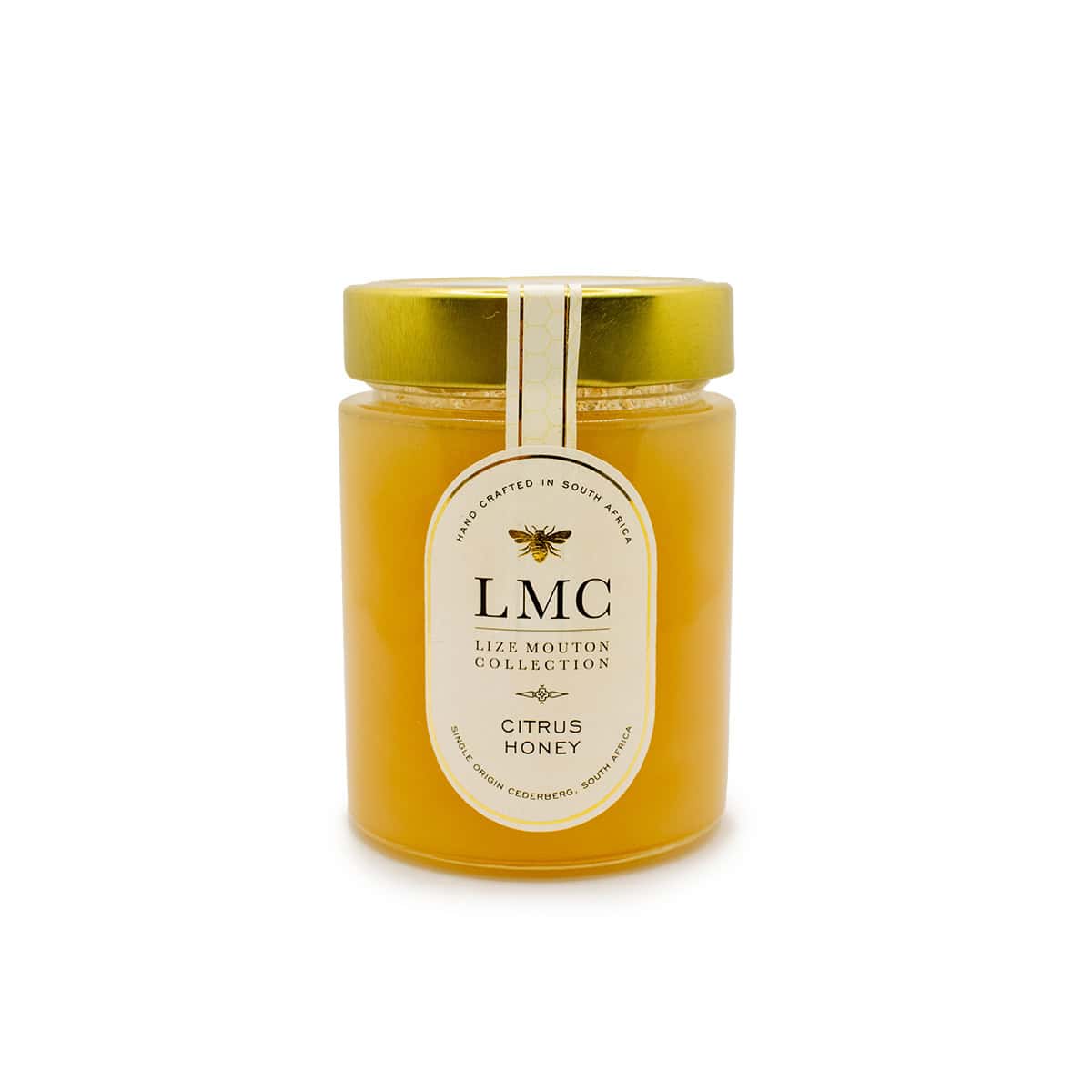 Sweet honey in a glass jar with a gold lid, featuring a South African crafted label, promoting natural citrus honey from Cederberg.