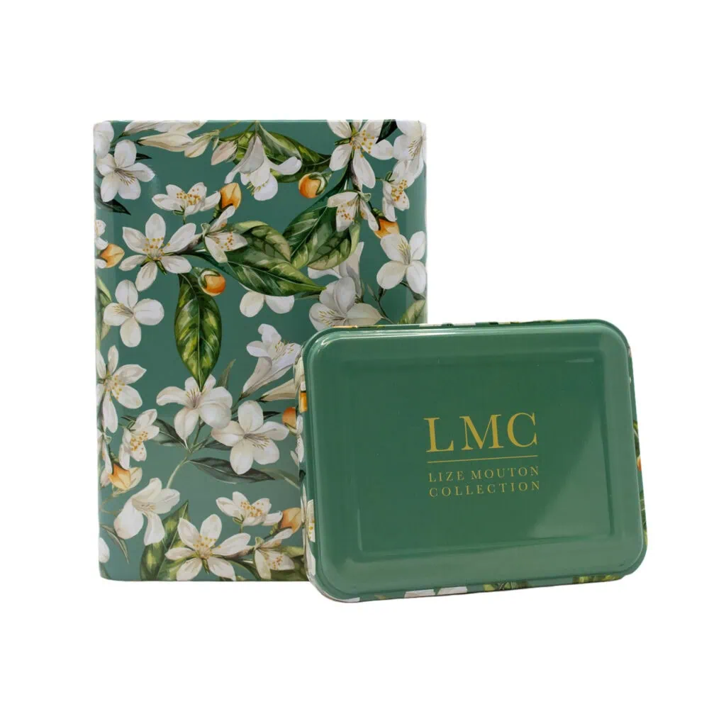 Elegant LMC Jasmine and Orange Blossom tea tin with floral design.