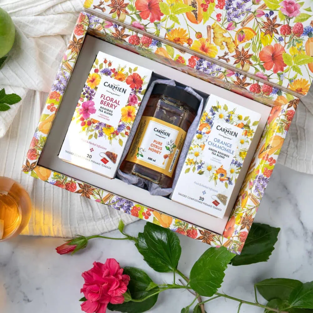 Elegant pyramid tea gift box with Citrus Honey, Orange Chamomile, and Floral Berry teas. Perfect for tea lovers seeking natural, aromatic herbal infusions.