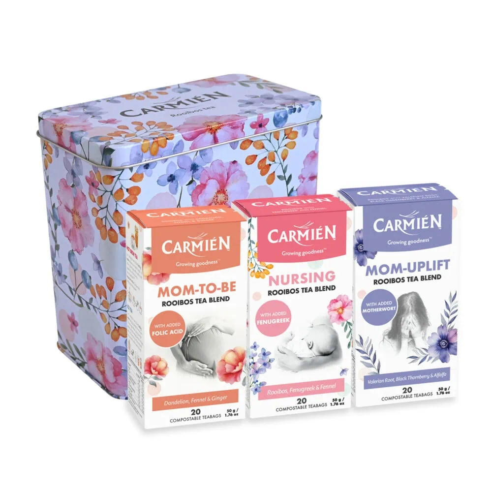 Carmién Rooibos tea gift set with Mom-to-Be, Nursing, and Uplift blends in floral packaging, ideal for tea lovers and health-conscious consumers.
